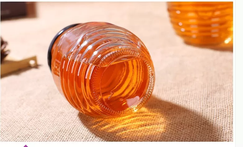 China 730ml Honeycomb Shape Glass Storage Jar Factory & Wholesaler | Glint Featured Image
