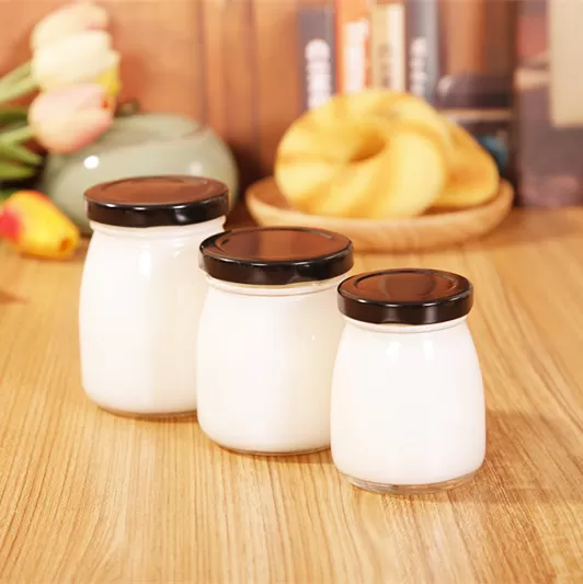 China 150ml 5oz Glass Pudding Yogurt Glass Jar with Metal Lid Factory & Wholesaler | Glint Featured Image