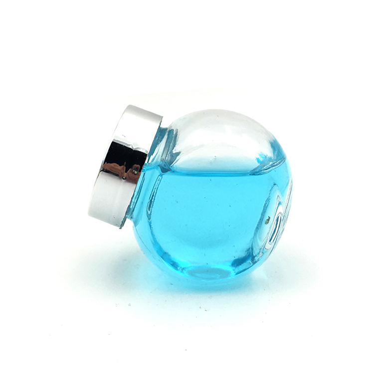 China 50ml Flat Drum Small Glass Food Container Factory & Wholesaler | Glint Featured Image