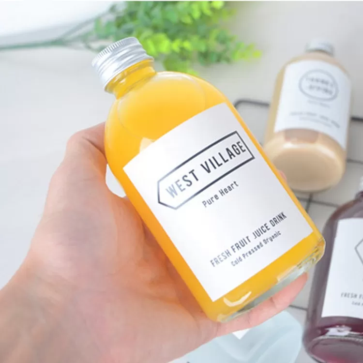 China 350ml Round Frosted Clear Glass Juice Bottle with Aluminum Lid Factory & Wholesaler | Glint Featured Image