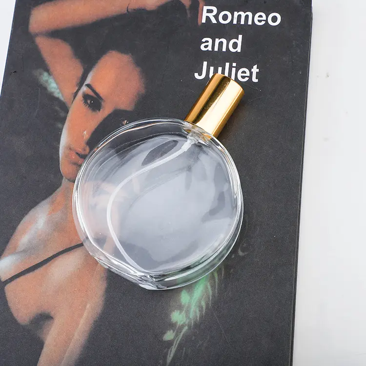 China 100ml Oblate Crimp Neck Perfume Bottle Factory & Wholesaler | Glint Featured Image